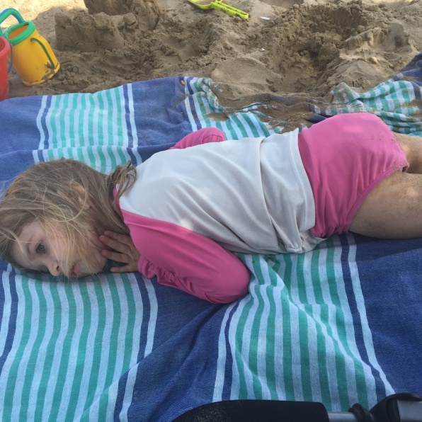 Pretending she was really going to sleep on the beach